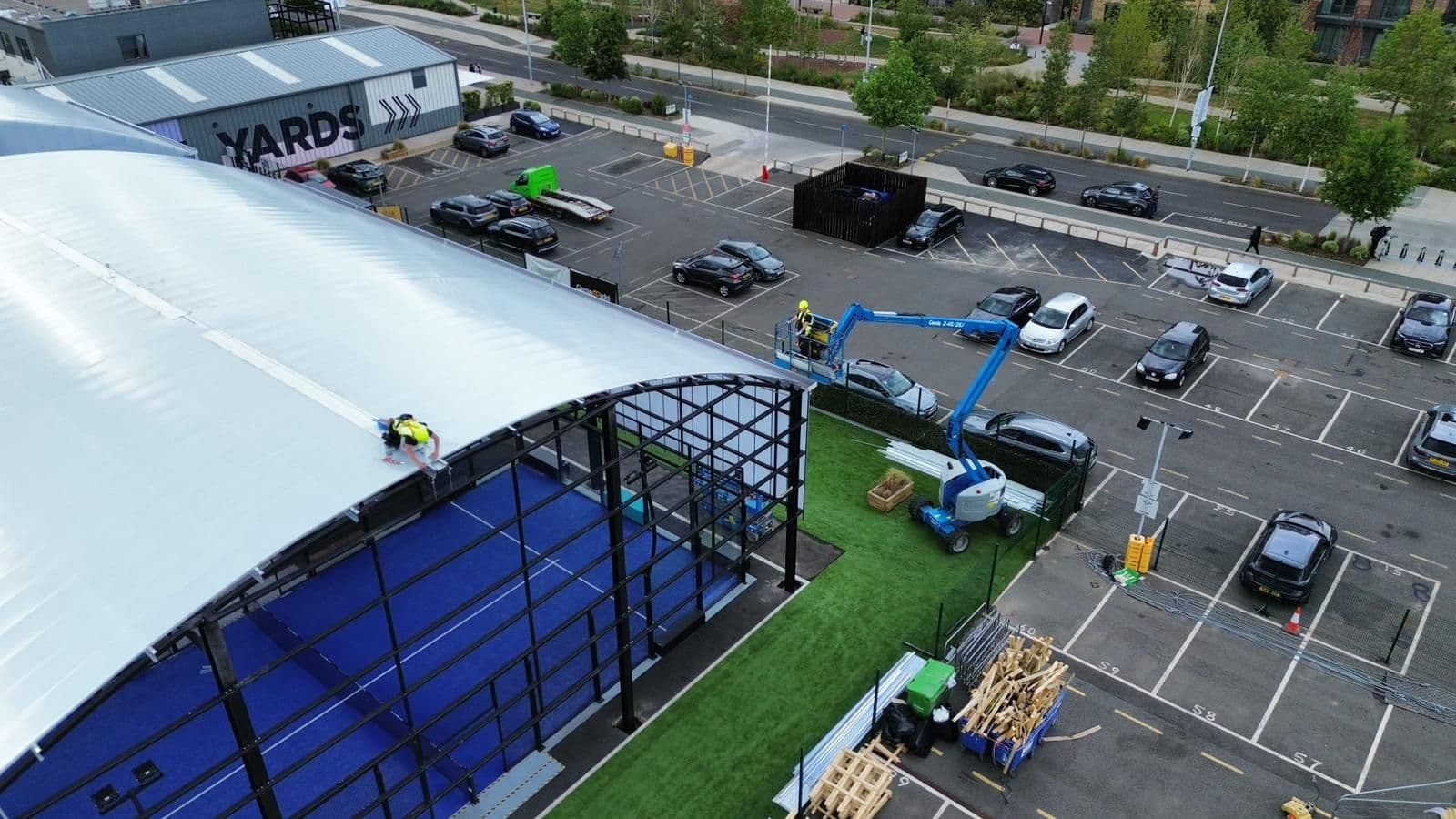 Aerial view of curved commercial roof